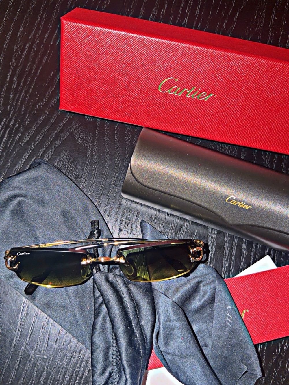 Cartier Gold Rimless Sunglasses with Olive-Green Lenses
